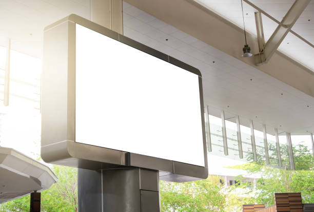 istock Billboard mockup and building background. Template of an empty information outdoor billboard indoor stadium with the roof, Mock-up of a city banner placeholder and poster. 1448264357