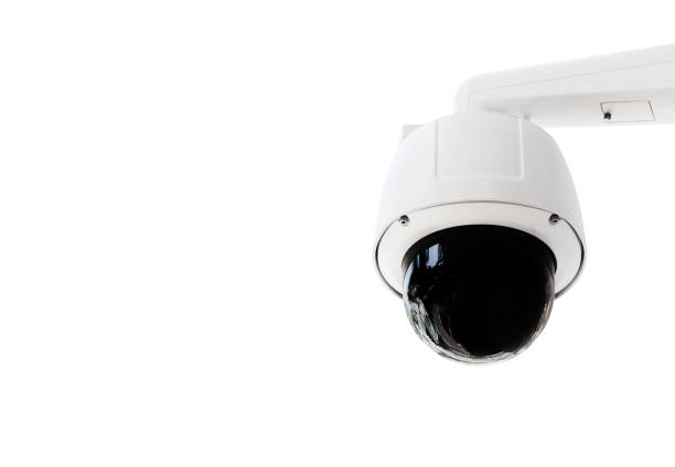 istock Modern public CCTV camera on wall isolated on white background. Intelligent reccording cameras for monitoring all day and night. Concept of surveillance and monitoring with clipping path copy space. 1448264615