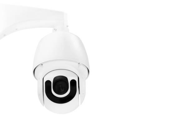 istock Modern public CCTV camera on wall isolated on white background. Intelligent reccording cameras for monitoring all day and night. Concept of surveillance and monitoring with clipping path copy space. 1448264616