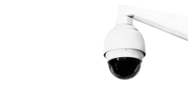 istock Modern public CCTV camera on wall isolated on white background. Intelligent reccording cameras for monitoring all day and night. Concept of surveillance and monitoring with clipping path copy space. 1448264655