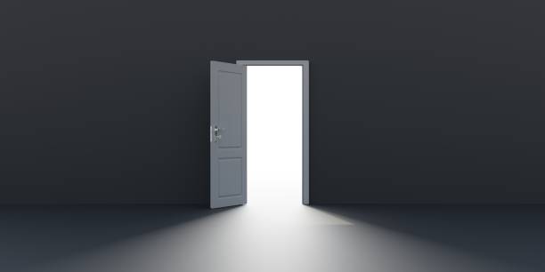 istock Open door on empty black wall background. Light enters from opening in dark room. 3d 1448265191
