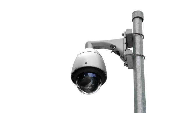 istock Modern public CCTV camera on pole isolated on white background. Intelligent recording cameras for monitoring all day and night. Concept of surveillance and monitoring with clipping path copy space. 1448265429