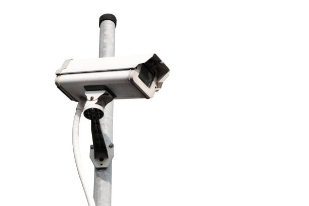 istock Modern public CCTV camera on pole isolated on white background. Intelligent recording cameras for monitoring all day and night. Concept of surveillance and monitoring with clipping path copy space. 1448265521