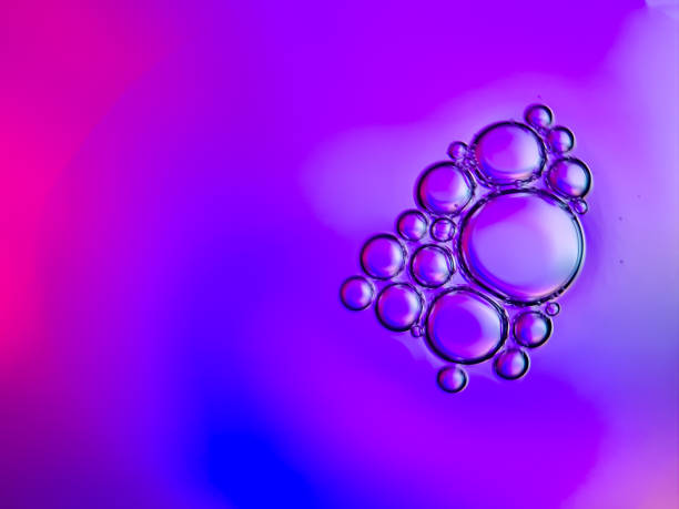 istock macro colorful soap bubbles gradient abstract background blue pink 1448271424