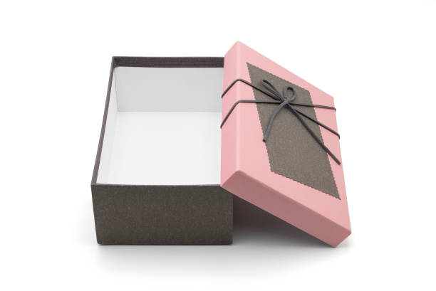 istock Open pink brown gift box and leather ribbon bow with tag isolated on white background with clipping path use for Valentine's Day, Happy Women's Day, Mother's Day, Birthday, Wedding, Christmas. 1448271564