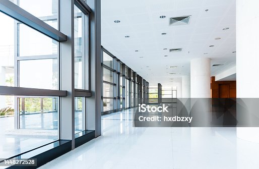 istock Empty corridor in the modern office building 1448272528