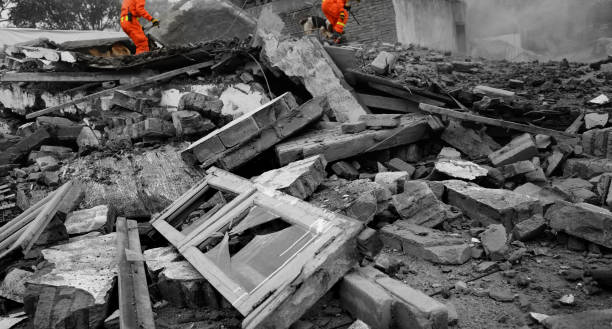 istock Search and rescue forces searching through a destroyed building 1448272633