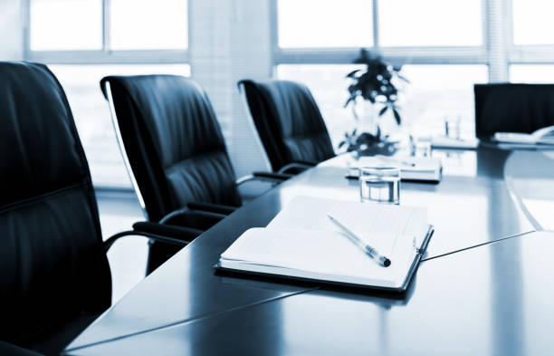 istock Notebook with pen in meeting room 1448272654