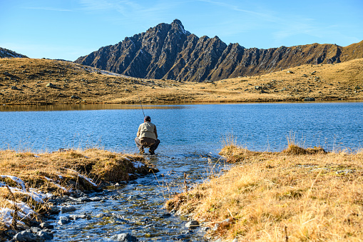 Fly fisherman at Taylor River, Colorado.