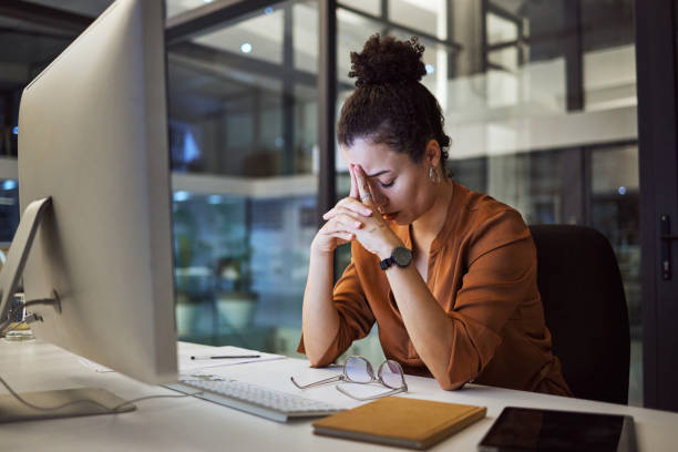 istock Headache, business woman at night and computer stress while working for a deadline with pc glitch. Sad corporate manager with anxiety about target working at desk screen late to complete task online 1448283744