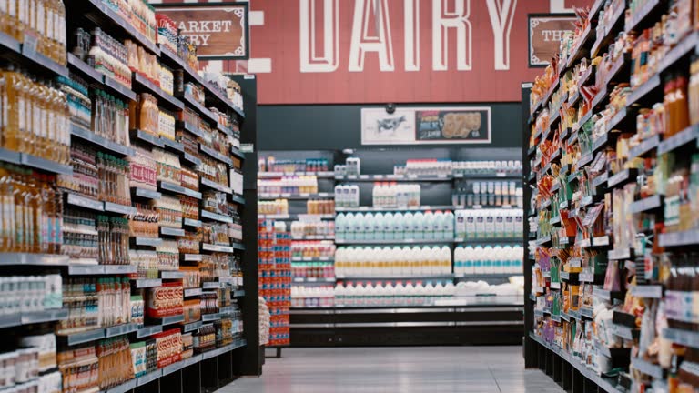 Supermarket, grocery store and product display on shelf, healthy food and diary nutrition. Aisel, groceries and retail market for customer shopping, food on shelves and shop or sale marketing