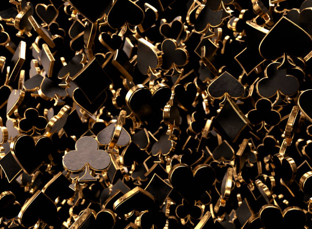 An array of black and gold casino card heart, diamond, spade, and club symbols floating in the air on a dark background - 3D render