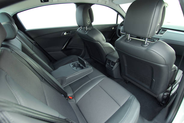 istock Rear seats covered with fabric in a luxury car 1448288897