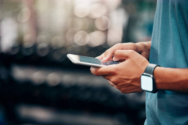 City, phone, and hands post on social media connected to internet with a website notification outdoors. News, digital and man online typing or texting on a social networking app and searching content stock photo