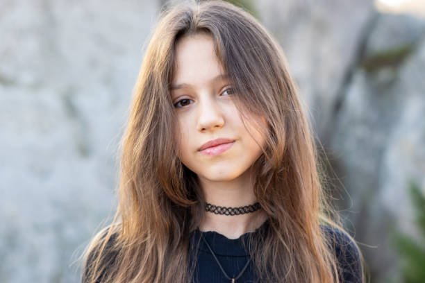 istock The girl poses on a platform in the mountains. 1448297187