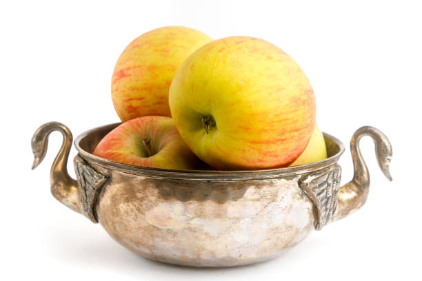 Apples Old fruit bowl with apples. antique fruit bowl stock pictures, royalty-free photos & images