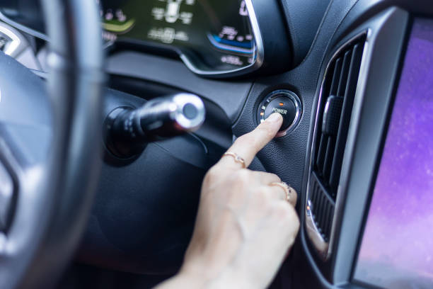 istock Woman starting an electric car 1448303159