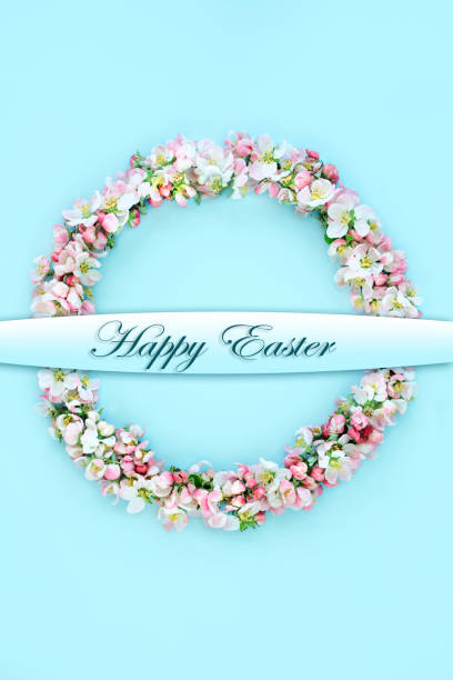 istock Happy Easter Wreath with Apple Blossom Flowers 1448303447