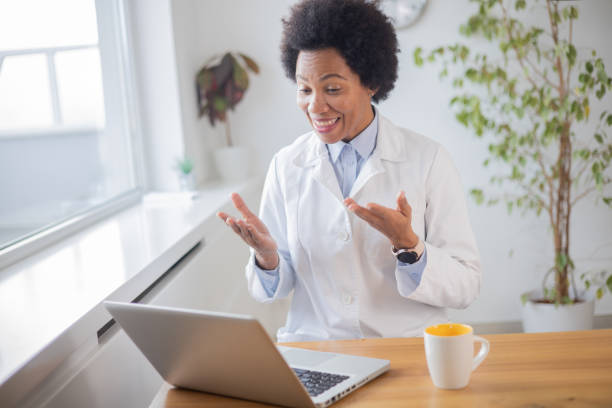 istock Female doctor making video call 1448306073