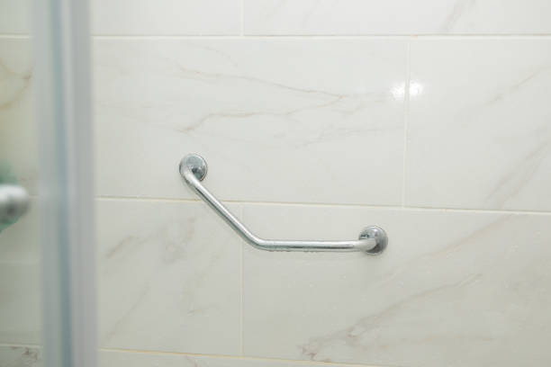 istock handrail in the shower, safe bathing for the elderly and people with limited mobility 1448307036