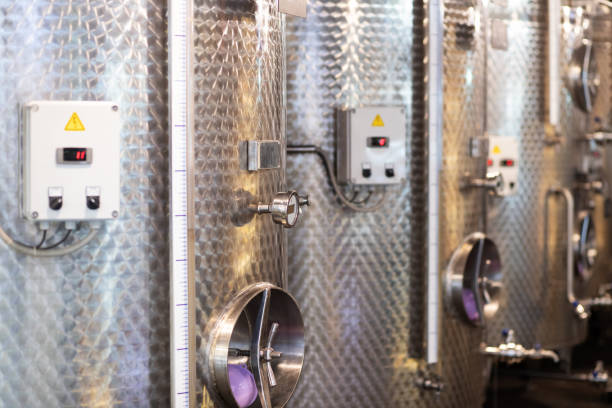 istock modern wine production, large steel tanks, fermentation process, winemaking 1448307106