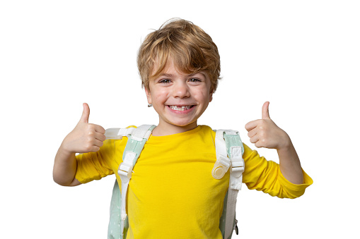 Primary school smiling boy girl PNG Isolated with backpack showing thumbs up. Copy space for advertising blank concept. Back to school. Childhood, education, products for children