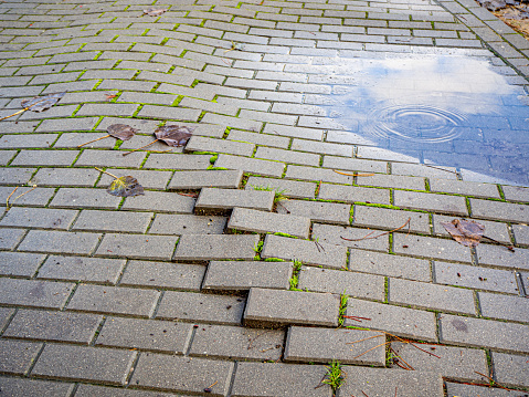 macro broken concrete pathway brick surface background, melancholy concept hd image