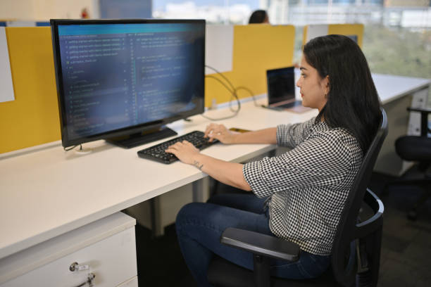 istock Woman working on a computer in an office 1448316494