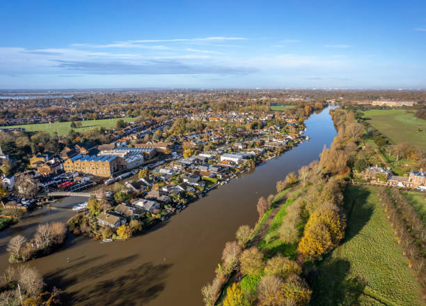 istock Thames River runs through the East Molesey and Hampton court park, with Thames Ditton Island inside. 1448318924