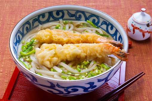 Tempura udon is a dish that plays tempura on typical noodle dish udon in Japan.