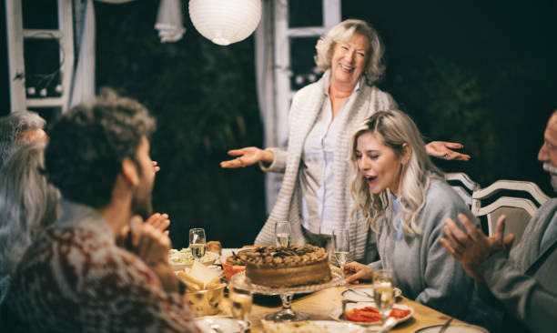 istock Family having dinner outdoors in their back yard. 1448327069