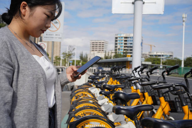 istock Asian women pay for transportation 1448327197