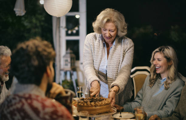 istock Family having dinner outdoors in their back yard. 1448327225