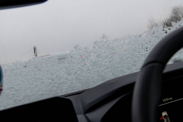 istock Snow and ice on car windscreen 1448328139