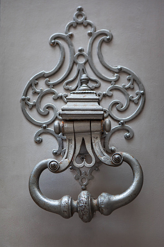 Close up of a stylish bronze door knocker