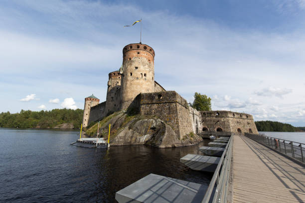 view of Olavinlinna castle in Savonlinna during summer Savonlinna, Finland - August 11, 2021: view of Olavinlinna castle in Savonlinna during summer etela savo finland stock pictures, royalty-free photos & images