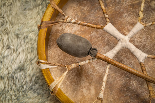 shaman frame drum with a beater stock photo