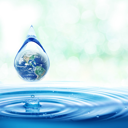 Concepto del Día Mundial del Agua con un mundo en agua limpia y agua azul fresca ondulaciones diseño, Ahorro de medio ambiente y concepto de tema ecológico photo