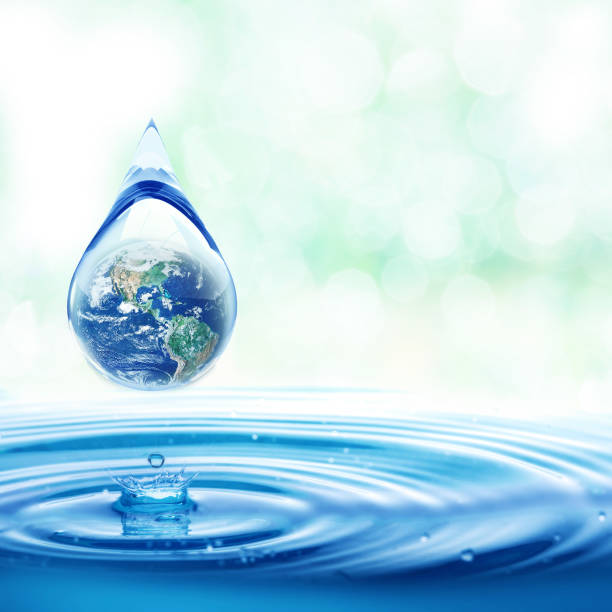 World Water day concept with world in clean water drop on and fresh blue water ripples design, Environment save and ecology theme concept stock photo