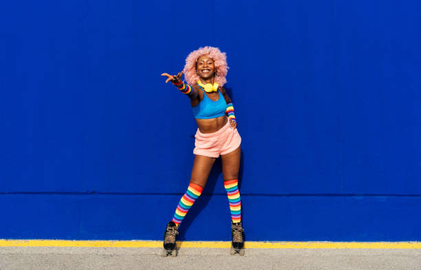 istock Beautiful woman skating with roller skates and having fun. 1448336387
