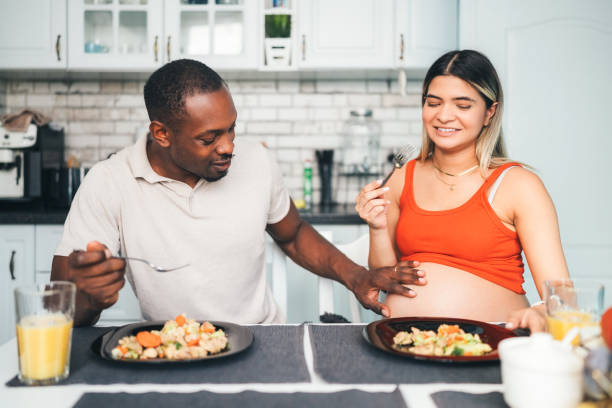 istock Young family eating low carb lunch 1448338363