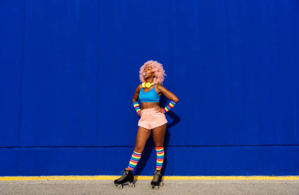istock Beautiful woman skating with roller skates and having fun. 1448338814