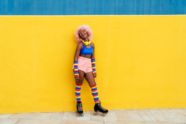 istock Beautiful woman skating with roller skates and having fun. 1448339014