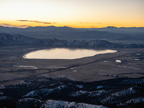 Frozen over Lake in Northern Nevada between Reno and Carson City at sunrise.