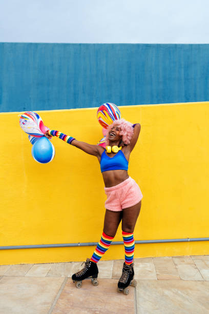 istock Beautiful woman skating with roller skates and having fun. 1448339907