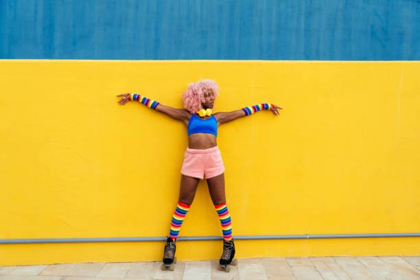 istock Beautiful woman skating with roller skates and having fun. 1448340041