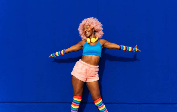 istock Beautiful woman skating with roller skates and having fun. 1448340304