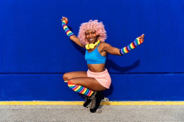 istock Beautiful woman skating with roller skates and having fun. 1448340326