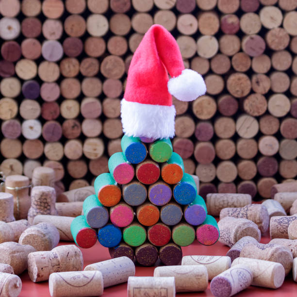 istock Wine cork Christmas tree in Santa hat 1448343459