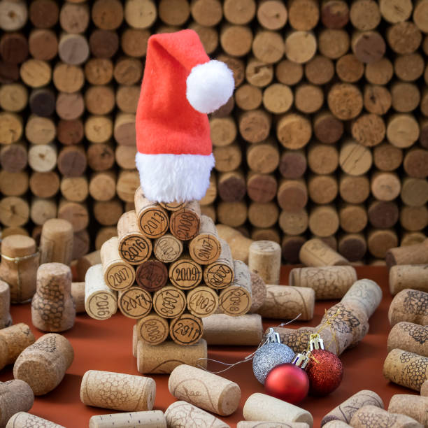 istock Wine cork Christmas tree in Santa hat 1448343491